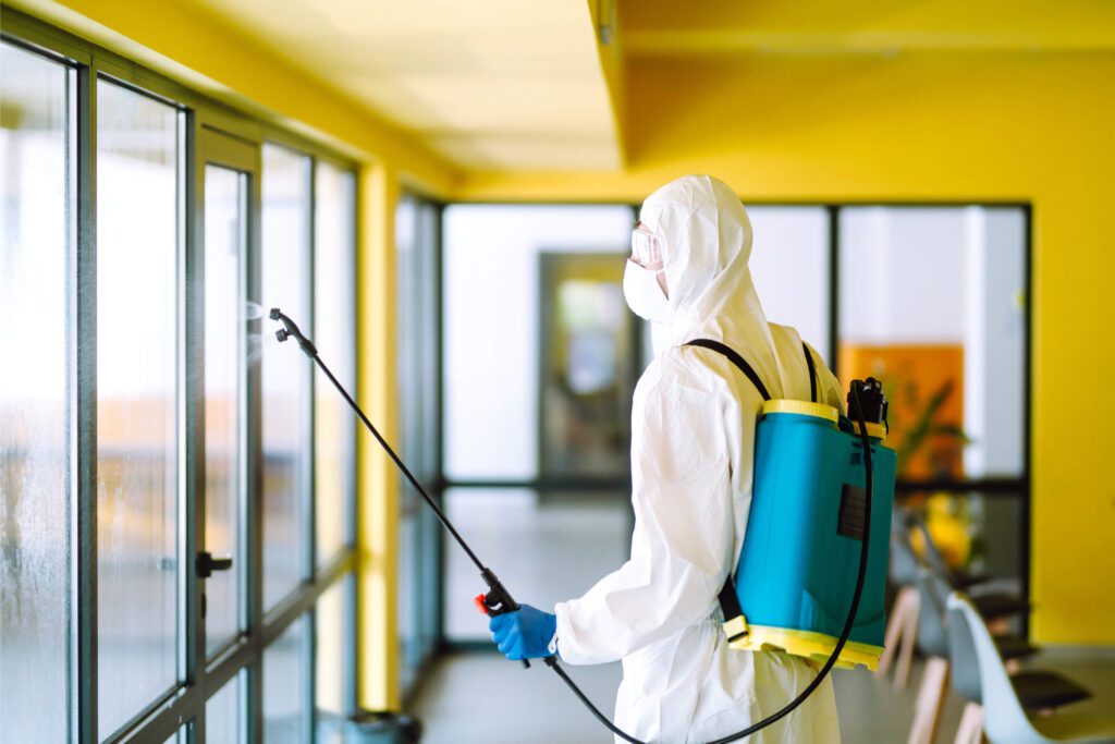 contractor disinfecting office for covid 19 corona T2UAXGK